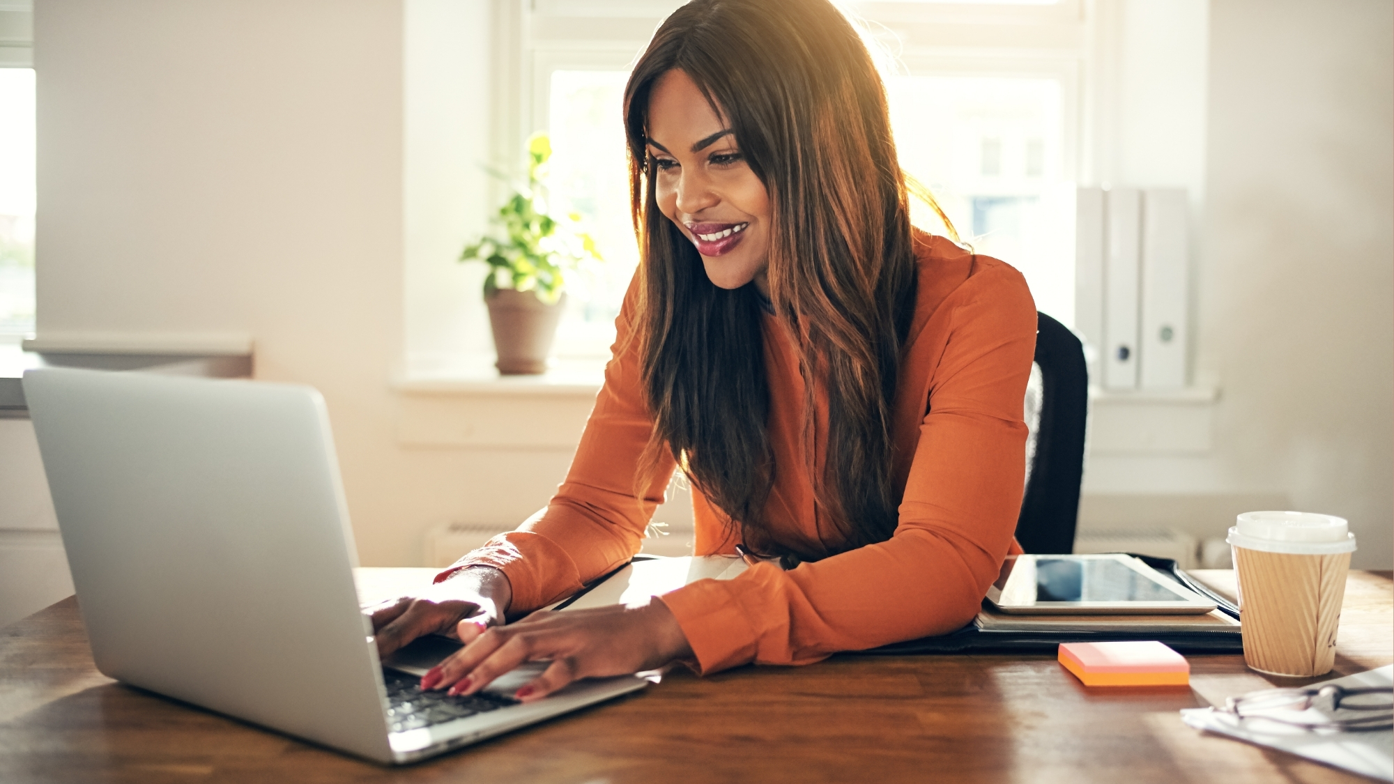 Spa employee typing on computer